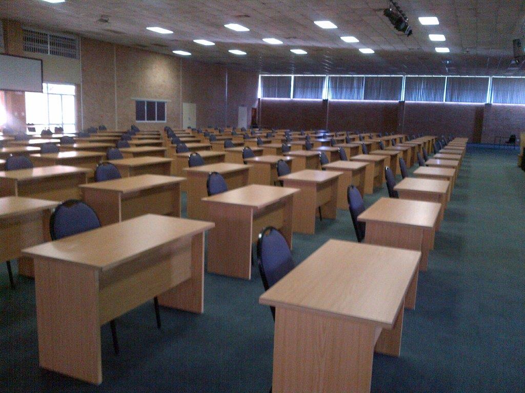 Exam desks and chairs setup for a school examination venue