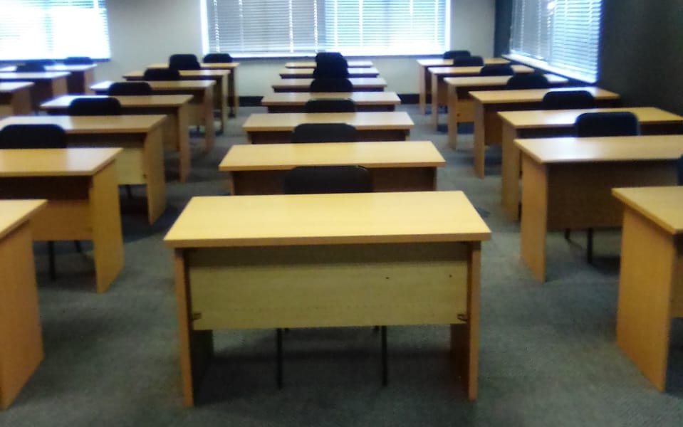 Learnership training desks and chairs setup for SITA-accredited training environments