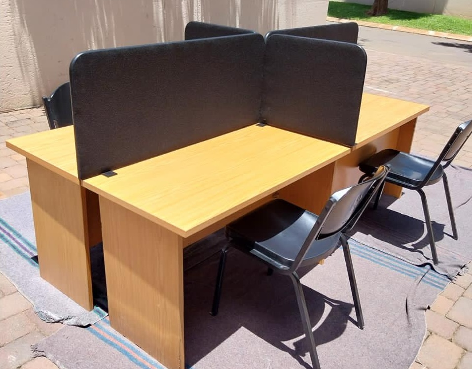 Office desk cluster layout for an open plan workspace